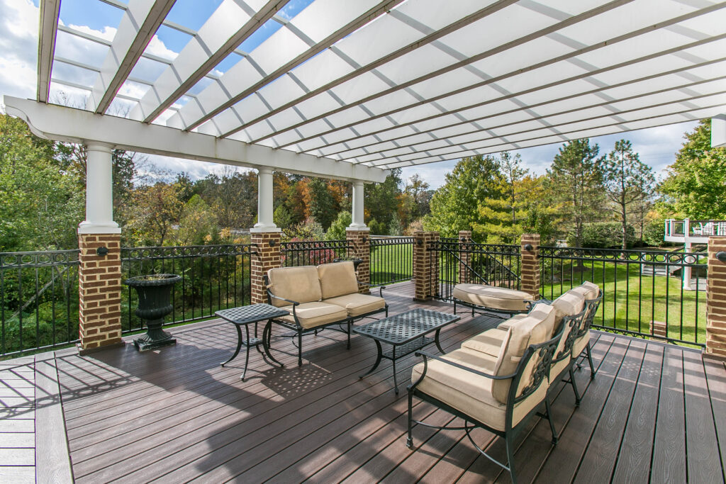 Pergola in Backyard over Deck and Outdoor Furniture