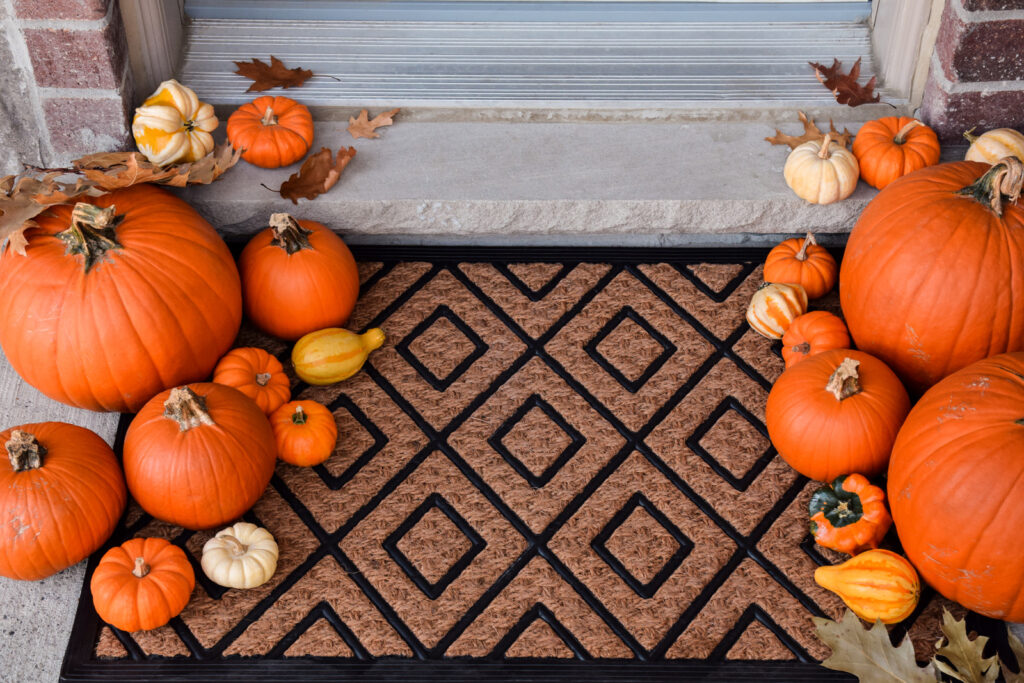 Consider adding Pumpkins to your list of screened-in porch ideas this Fall