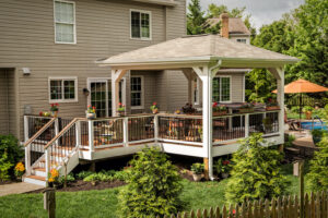 Corner deck design creating a private outdoor living space in a small yard