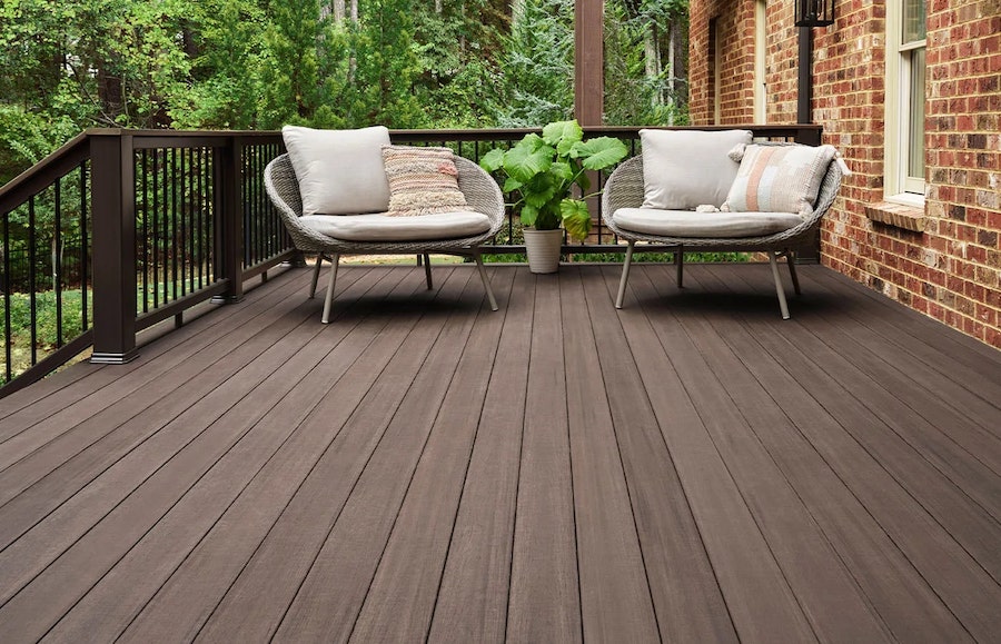 Beautiful custom deck that complements the home's architecture and landscaping