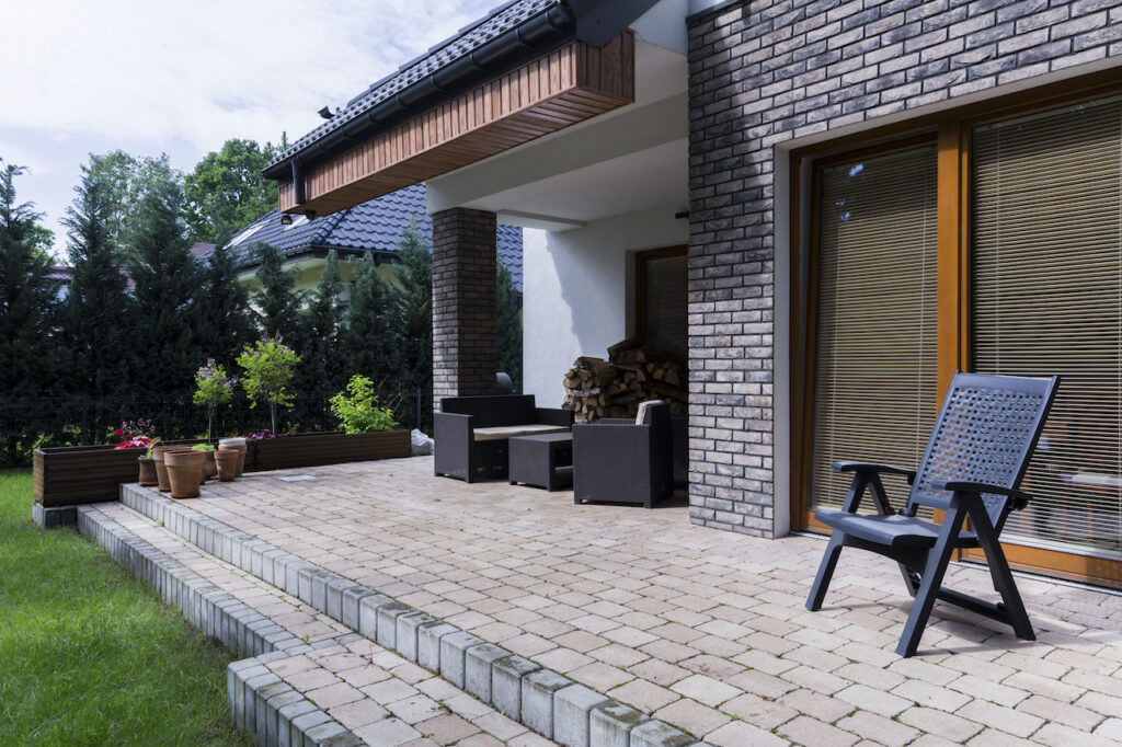 Pavers vs. Flagstone vs. Poured Concrete Patios: Which Is Right for Your Yard?
