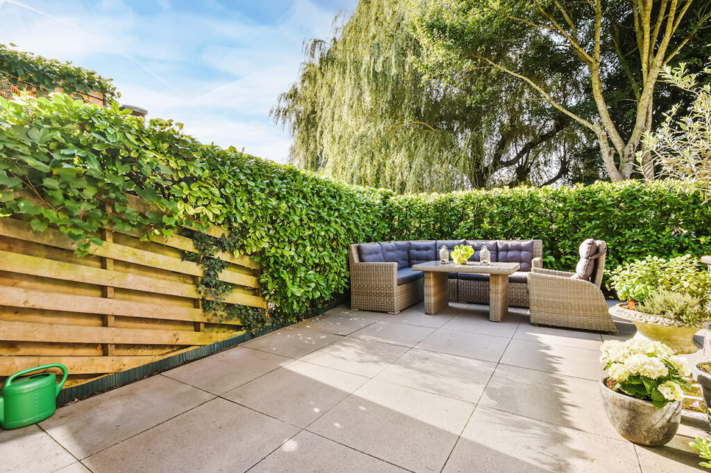 Pavers vs. Flagstone vs. Poured Concrete Patios: Which Is Right for Your Yard?