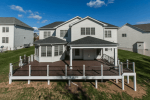 Elevated deck extending from an upper-level living area with usable space underneath