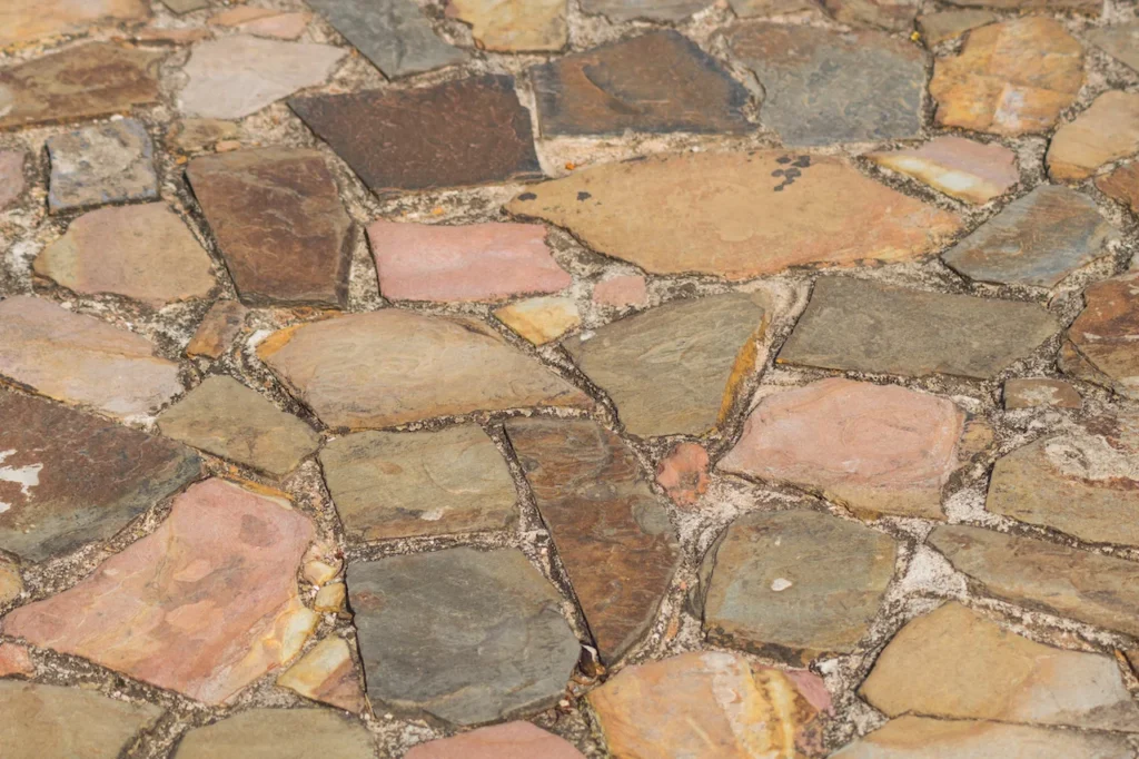 Pavers vs. Flagstone vs. Poured Concrete Patios: Which Is Right for Your Yard?